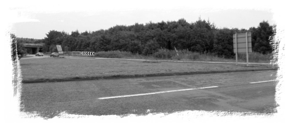 Handy off-road parking under that bridge over there...  and oodles of space under the roundabout's trees...