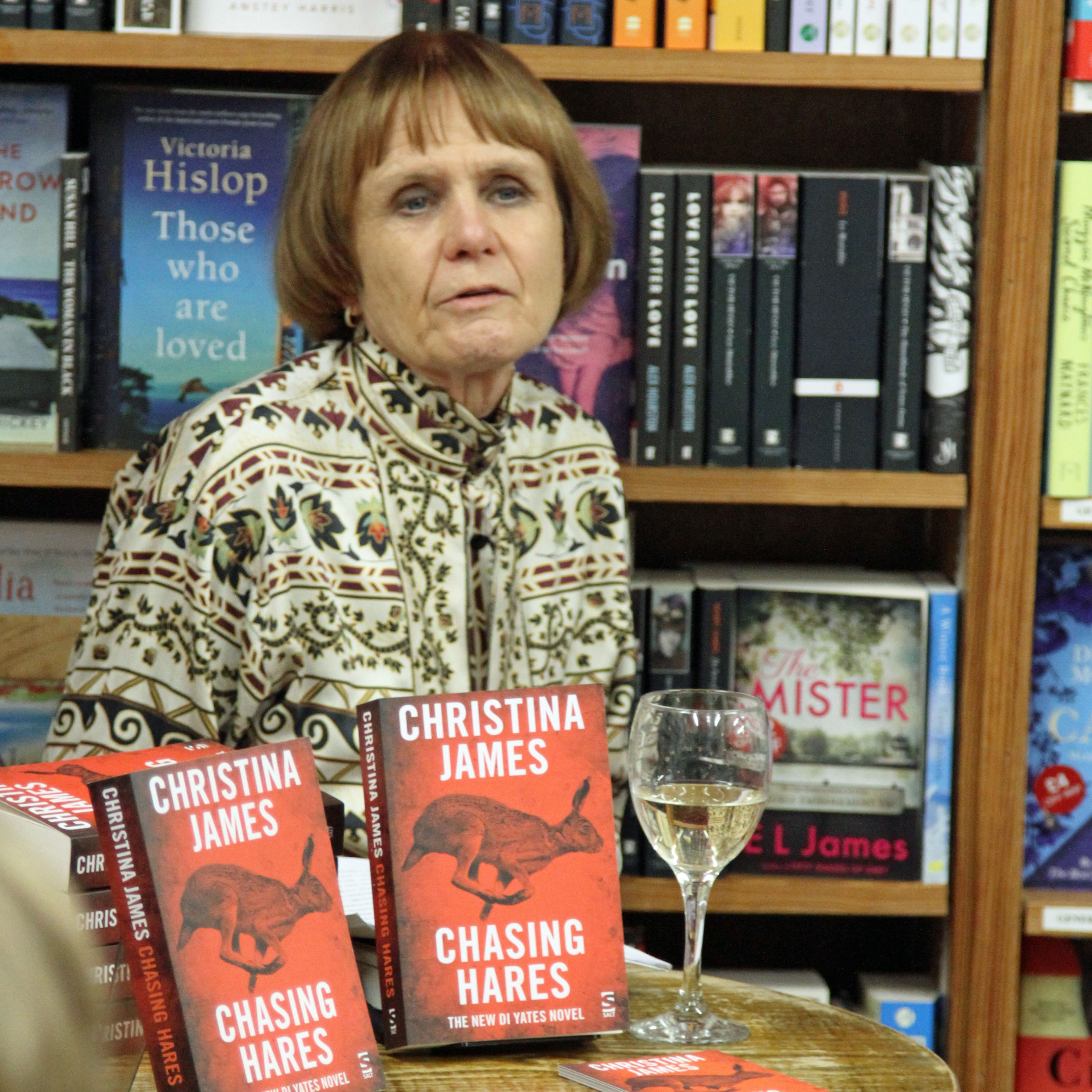 Christina James, speaking at the evening launch of 'Chasing Hares', at Bookmark